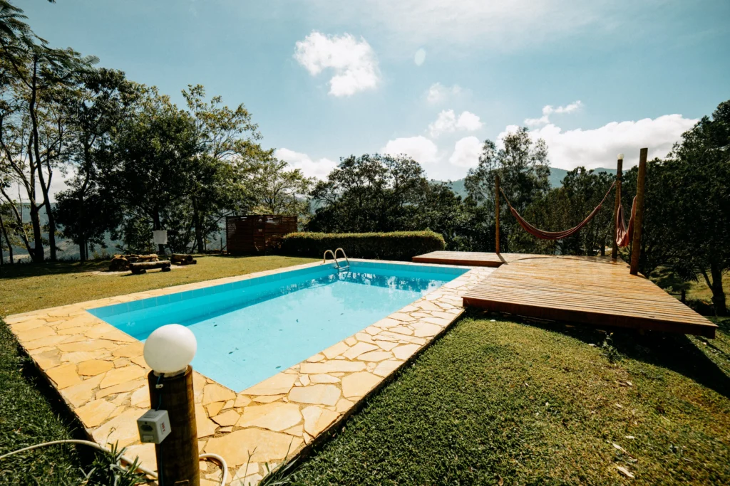 An empty swimming pool on private property.