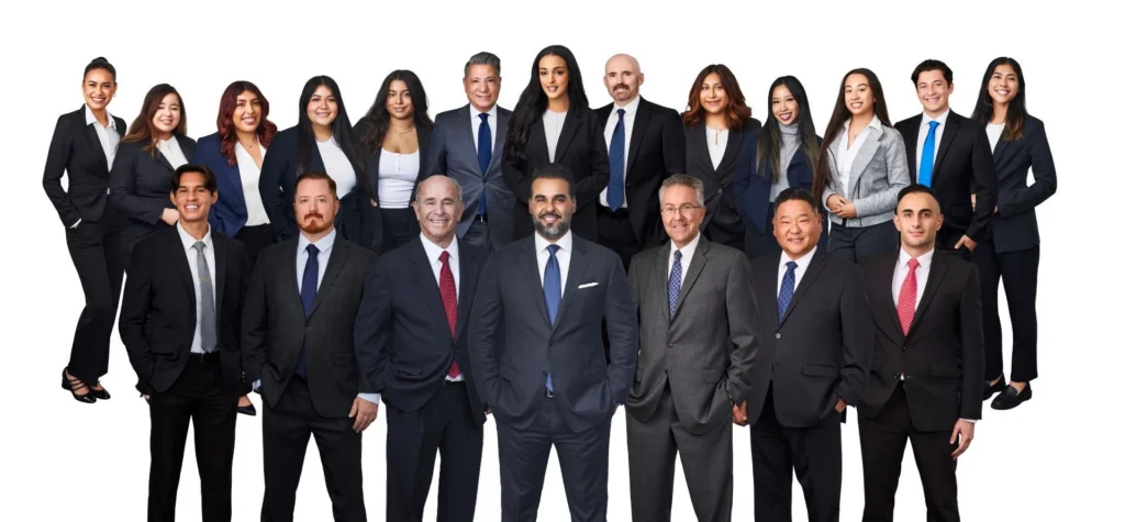 Group photo of the Insider Accident Lawyers team, all dressed professionally in black suits.