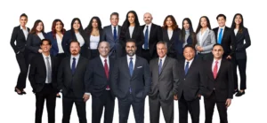 Group photo of the Insider Accident Lawyers team, all dressed professionally in black suits.