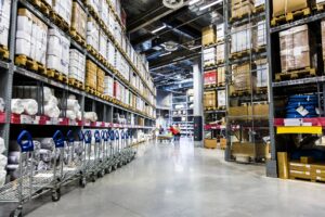 qtq80-q0B7d9 - Insider Accident Lawyers A wholesale grocery store with shelves filled with boxes, ready to fall.